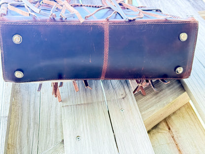 The Everglades Outrider: Distressed Brown Leather Western Purse with Braided Straps and Hair on Cowhide