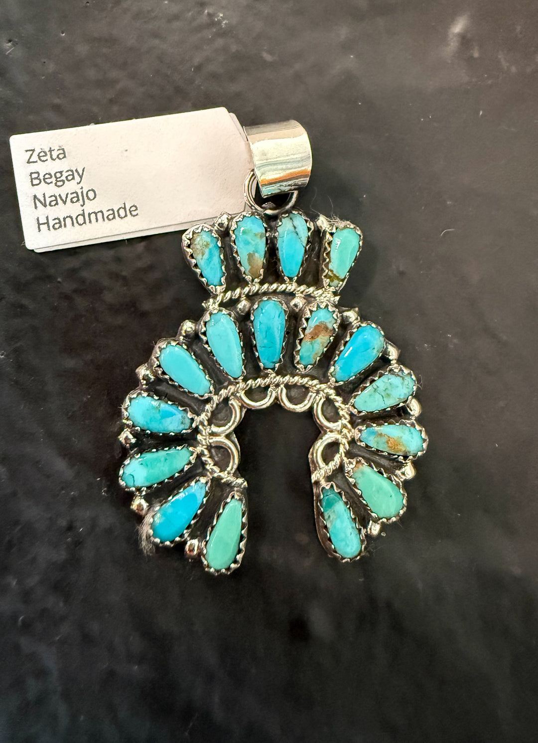 Navajo Kingman turquoise cluster naja pendant handmade by Zeta Begay sterling silver