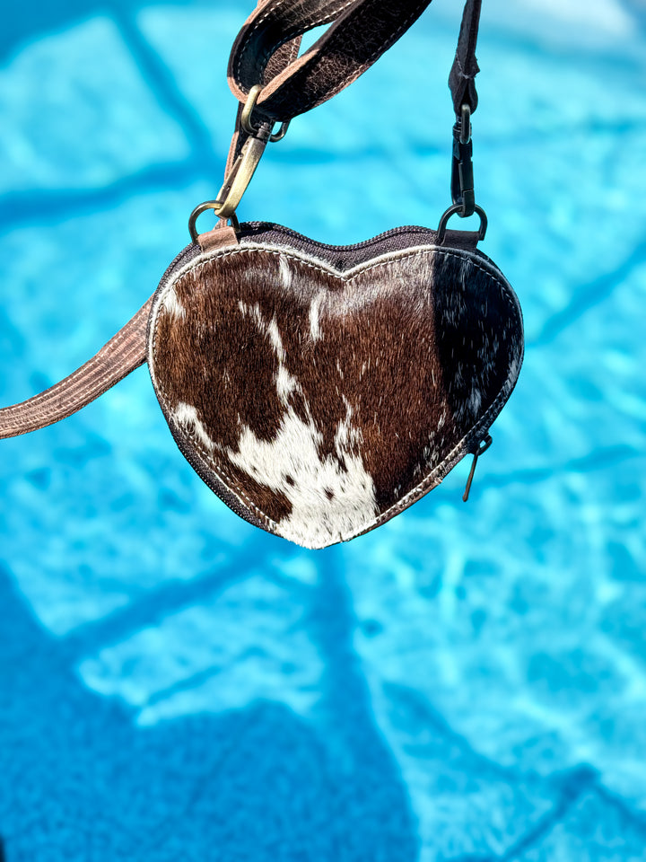 Brown and white hair\-on cowhide heart\-shaped mini crossbody bag with brown leather strap