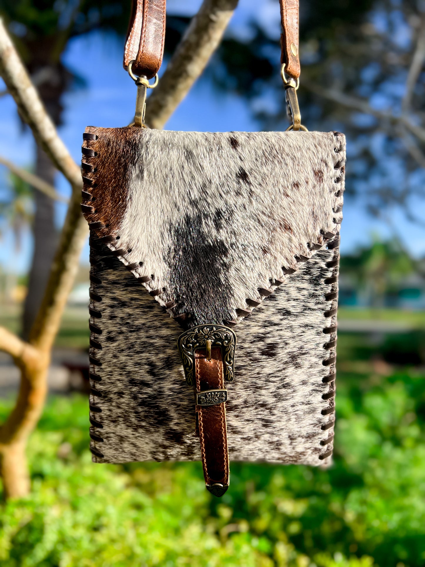 Cowhide buckle crossbody / carry bag