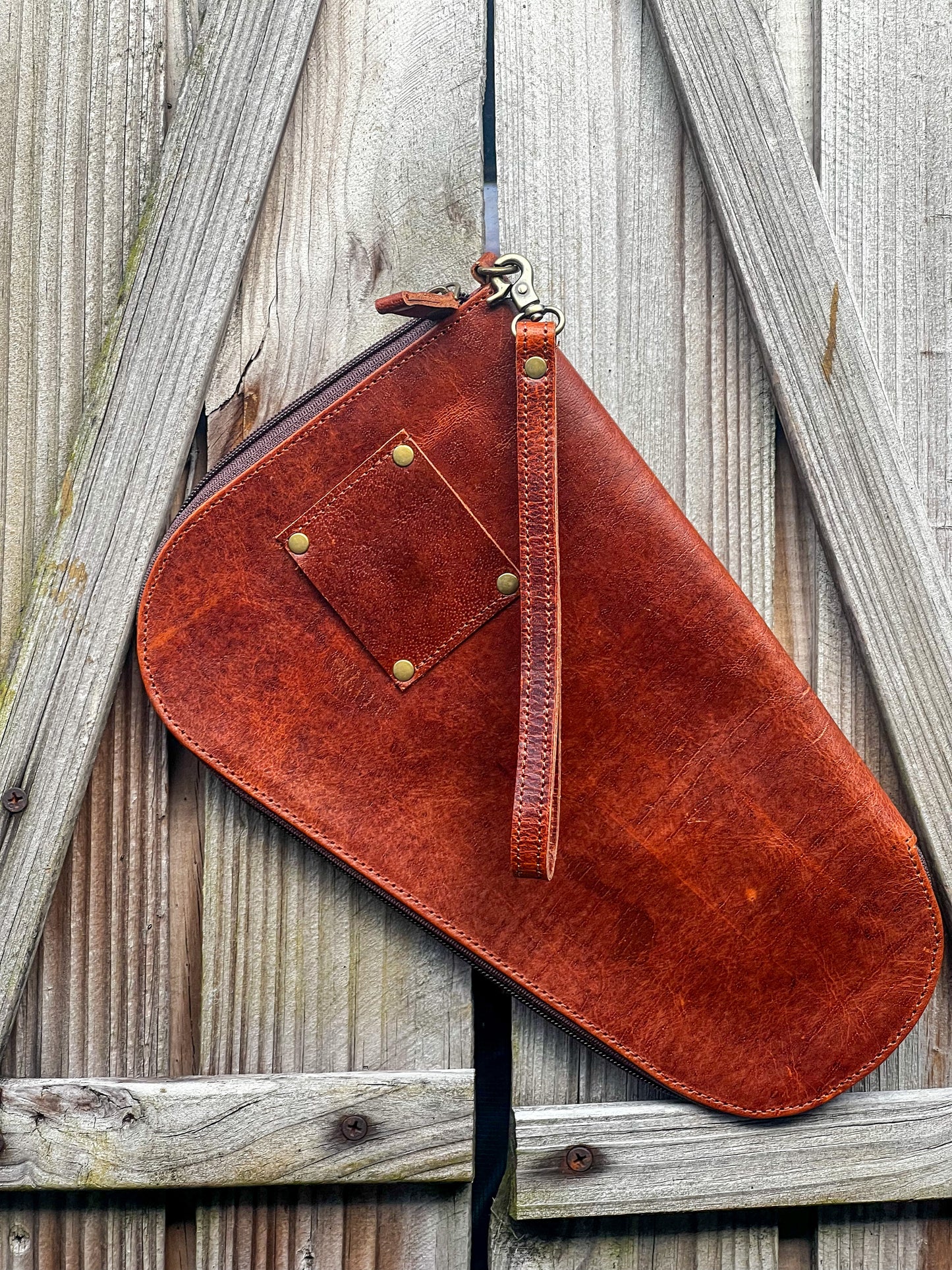 Tooled leather and cowhide zipper handgun case