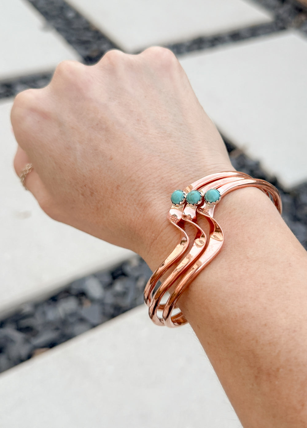 Native American Navajo handmade copper cuff bracelets with Kingman turquoise by Glen Sandoval