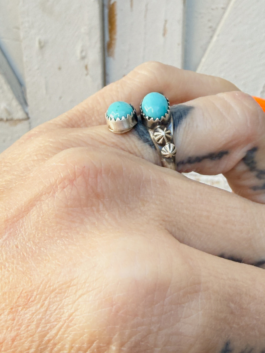 Kingman turquoise Navajo bypass ring by Freda Martinez Close up side view showing handmade Concho detail 