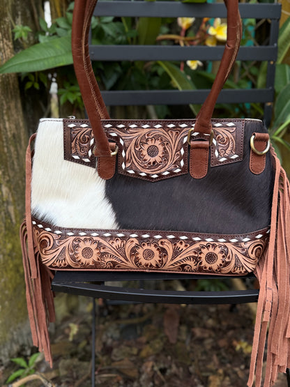 The Frontier Fringe Carryall : Cowhide, tooling, fringe, and function. Includes concealed carry pocket and two ways to wear