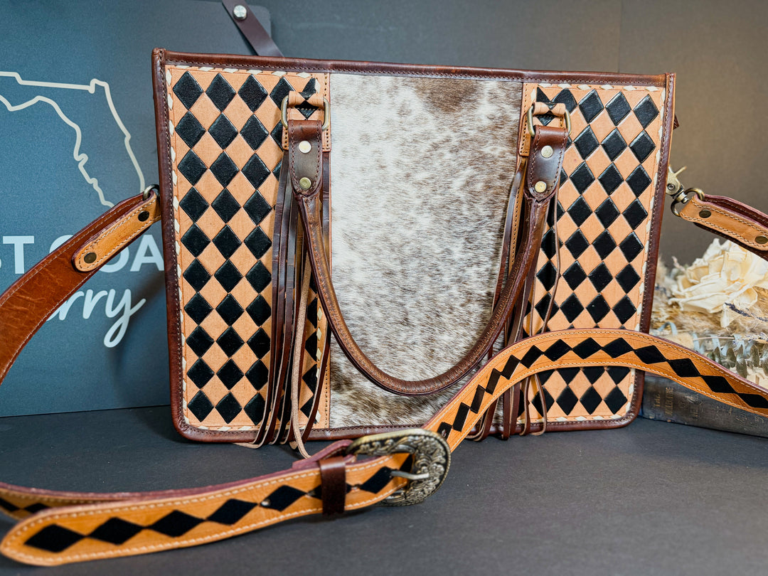 Artisan-crafted cowhide and leather tote bag from East Coast Carry.