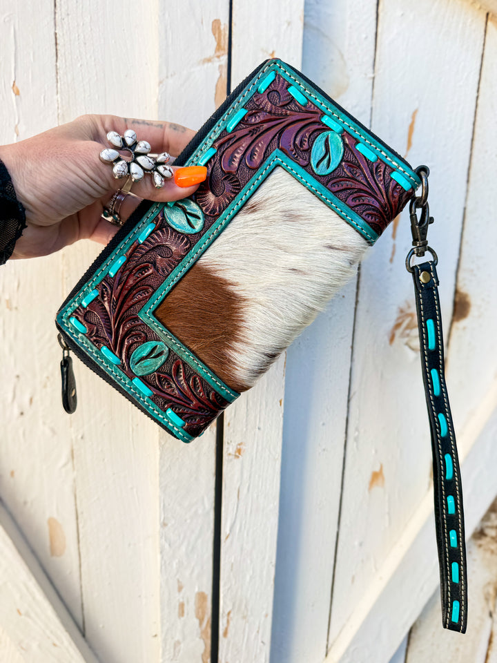 Painted turquoise cowhide phone wristlet with tooled leather