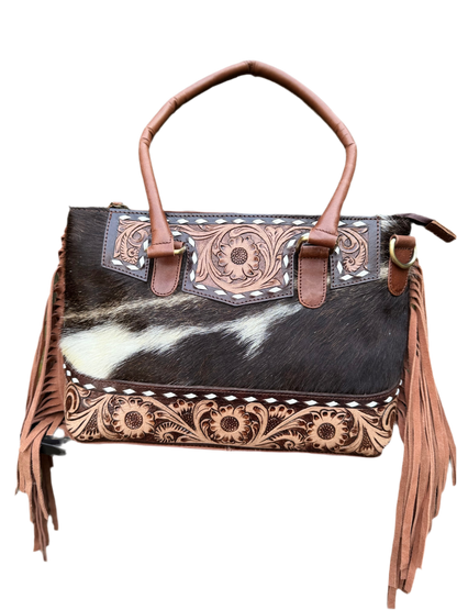 The Frontier Fringe Carryall : Cowhide, tooling, fringe, and function. Includes concealed carry pocket and two ways to wear