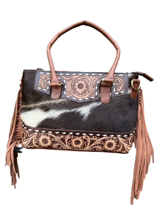 The Frontier Fringe Carryall : Cowhide, tooling, fringe, and function. Includes concealed carry pocket and two ways to wear