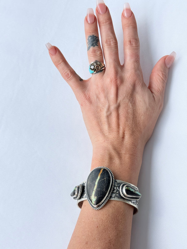 One of Seven | Rick Enriquez Navajo Black Jack Turquoise Sterling Silver Cuff