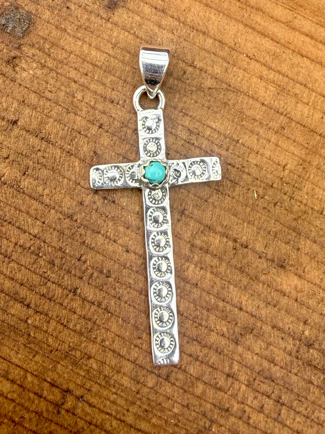 sterling silver cross pendant kingman turquoise southwestern style
turquoise cross necklace 925 silver western jewelry
minimal silver cross turquoise center stone