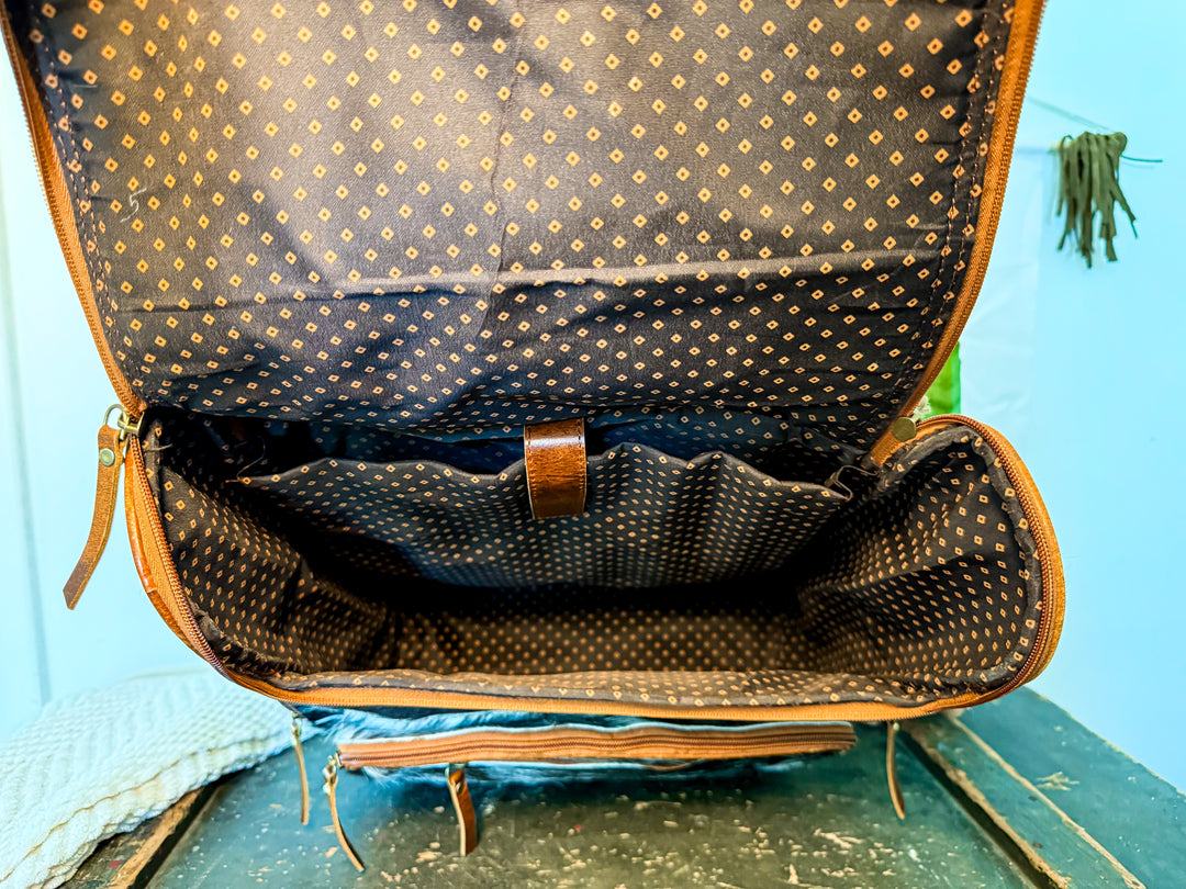 The Bubba Bag | Hair on Cowhide Full Grain Leather All Adventures Backpack in Dark Hide Pattern