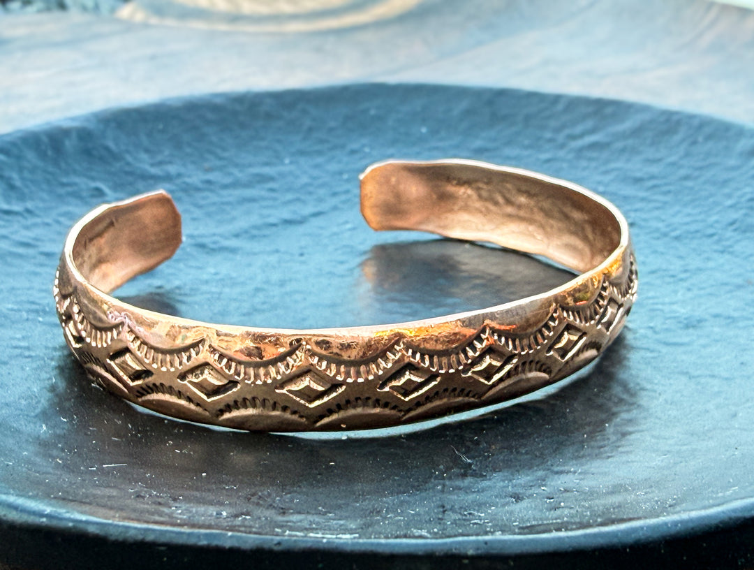 Hand stamped Navajo copper cuff bracelet scallop diamond design