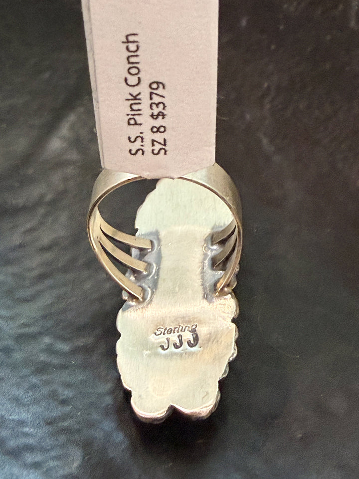 Back view of pink conch cluster Navajo ring handmade Native American jewelry signed JJ for Jeff James Jr. 