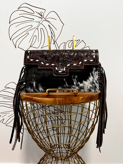 Fancy Seeing you Here: Tooled Brown Leather and Black Cowhide Hand Clutch
