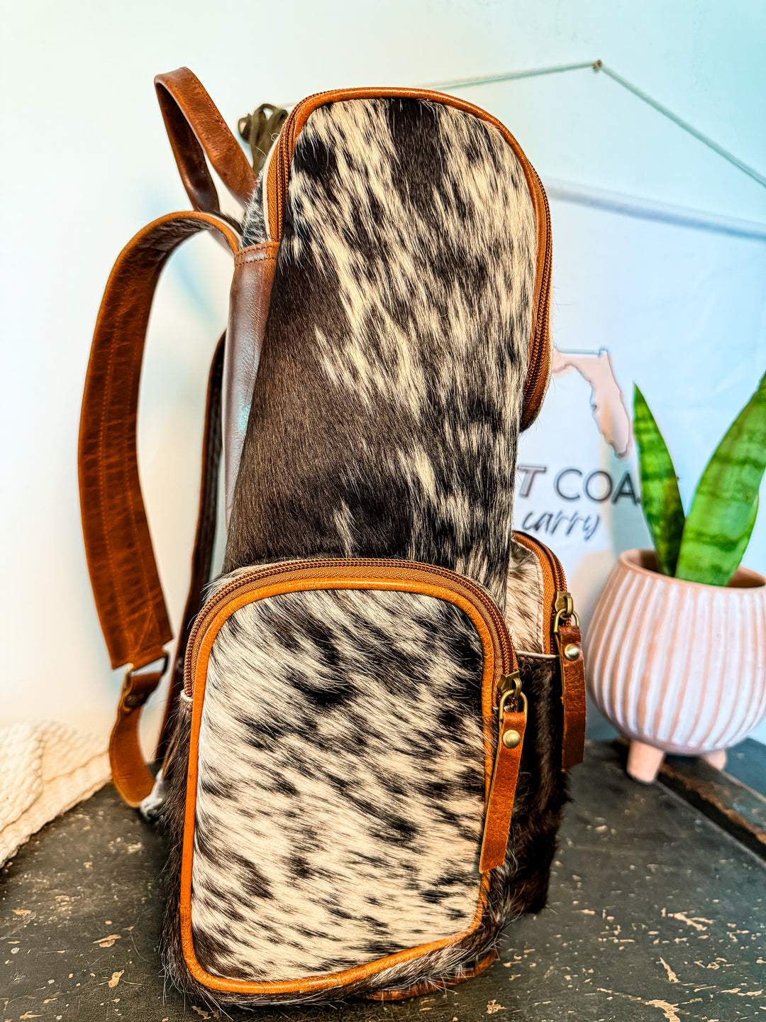 The Bubba Bag | Hair on Cowhide Full Grain Leather All Adventures Backpack in Dark Hide Pattern