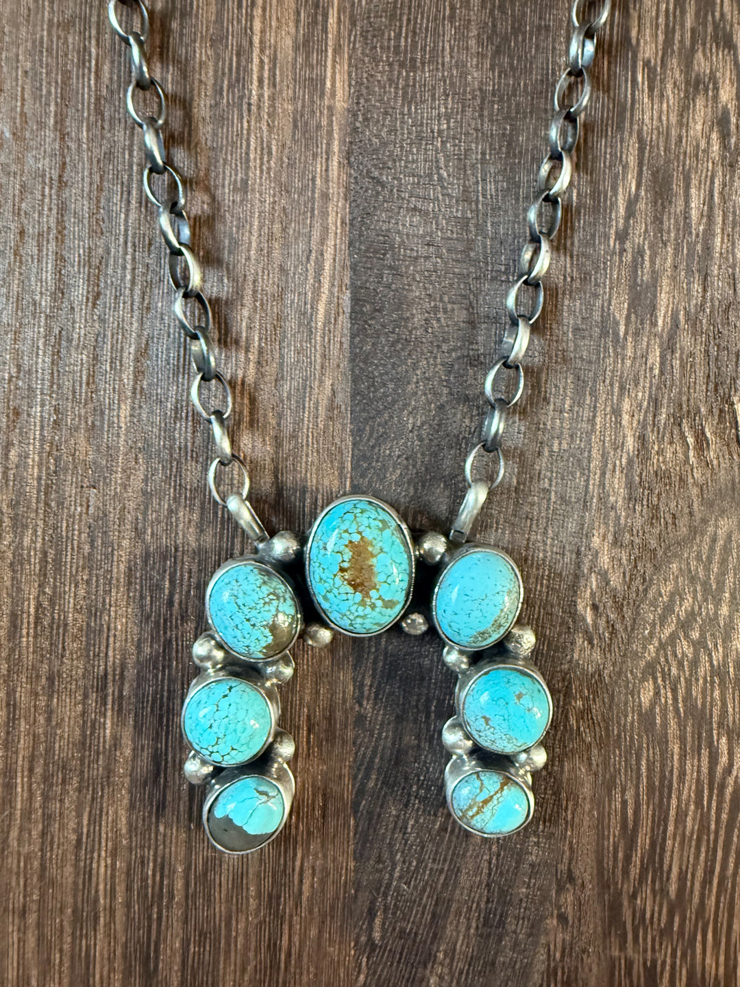 Navajo sterling silver naja necklace with No. 8 turquoise stones by Augustine Largo on 16 inch chain