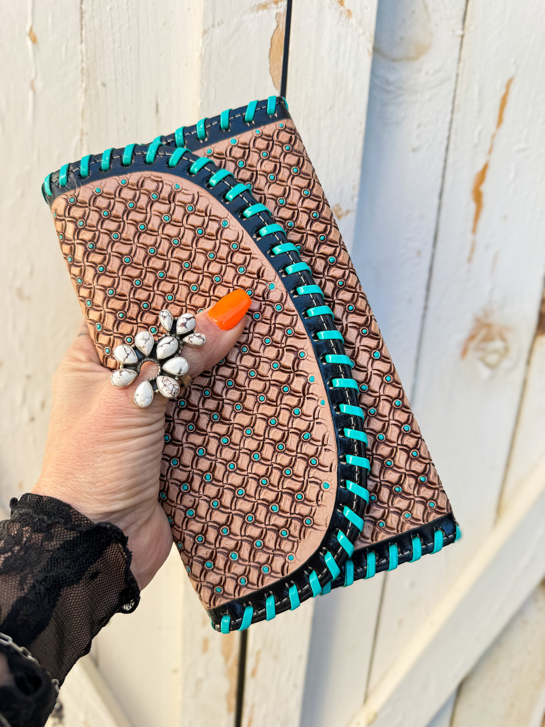 Stamped southwestern leather phone clutch with whipstitch and Kingman blue painted detail