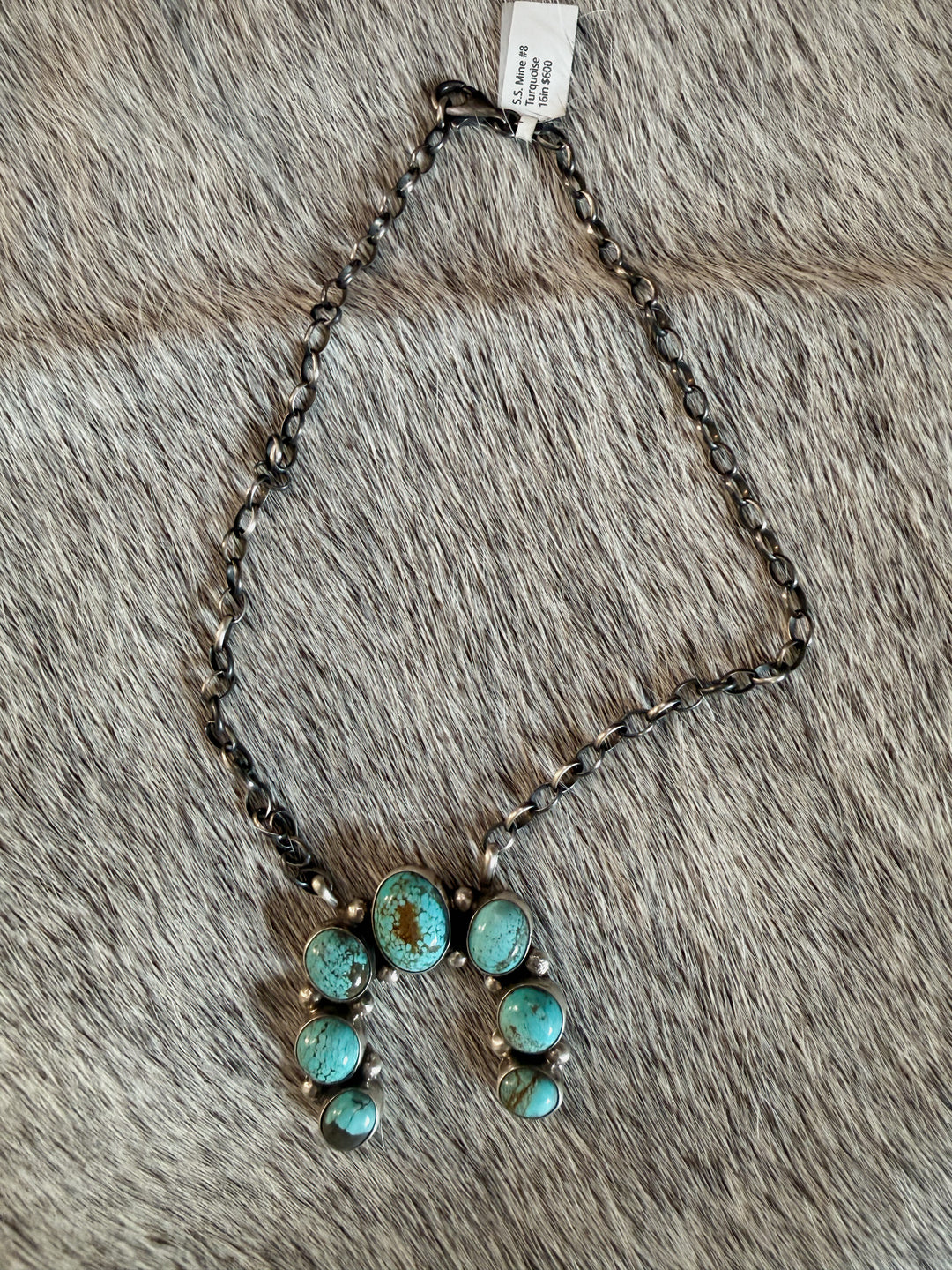 Navajo sterling silver naja necklace with mine No. 8 turquoise stones by Augustine Largo on 16 inch chain