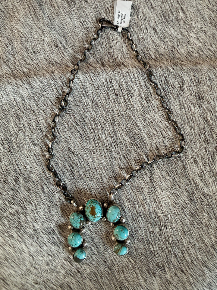 Navajo sterling silver naja necklace with mine No. 8 turquoise stones by Augustine Largo on 16 inch chain