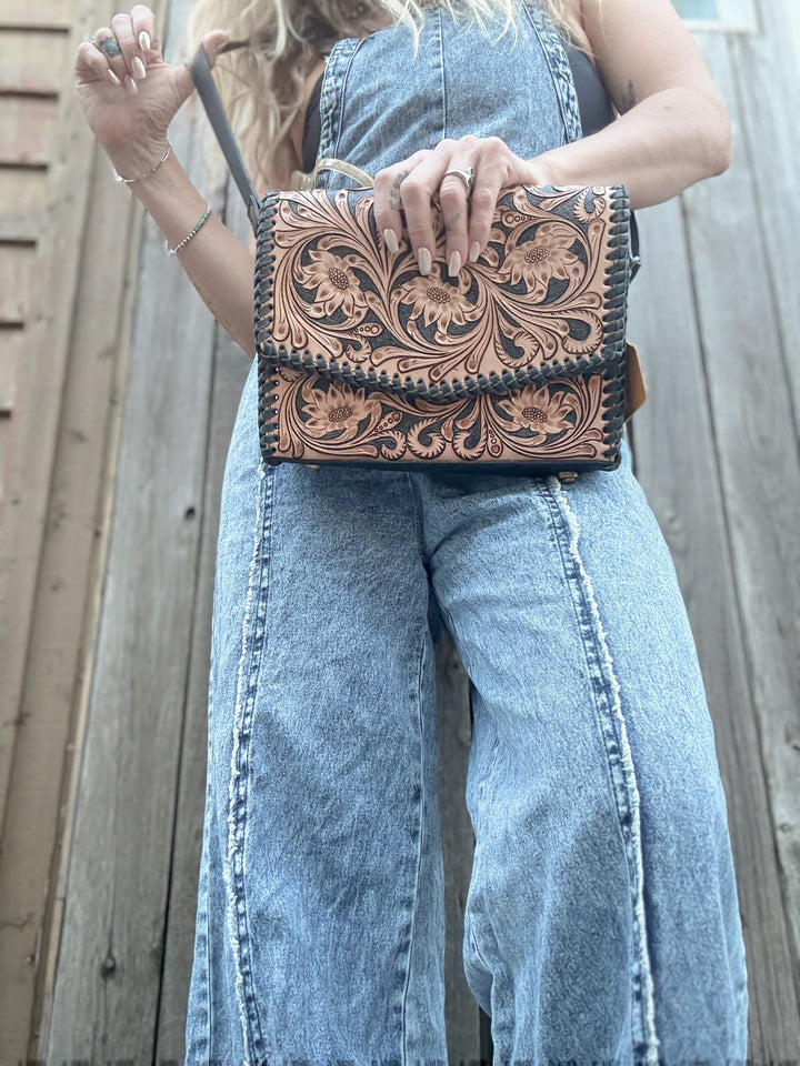 Black and Brown Tooled leather floral crossbody western purse with black whipstitch edge and adjustable strap