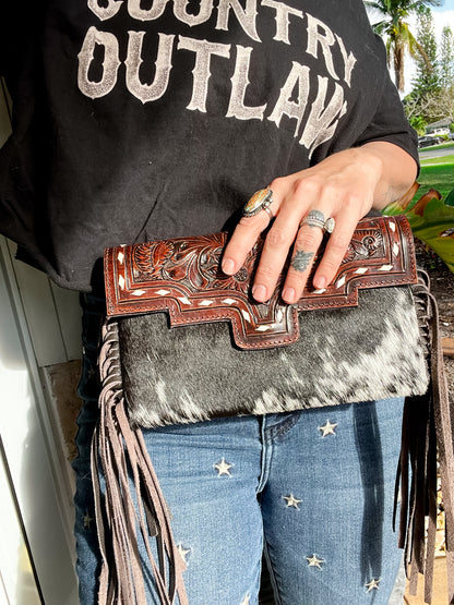 Fancy Seeing you Here: Tooled Brown Leather and Black Cowhide Hand Clutch