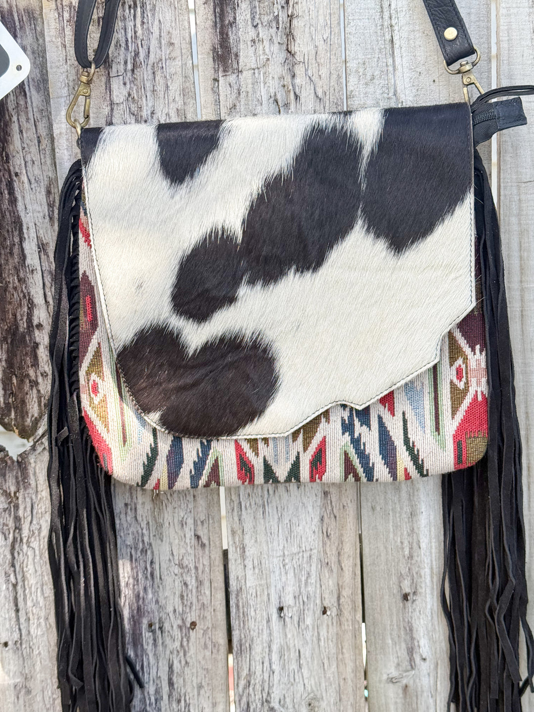 Women’s concealed carry purse with cowhide flap