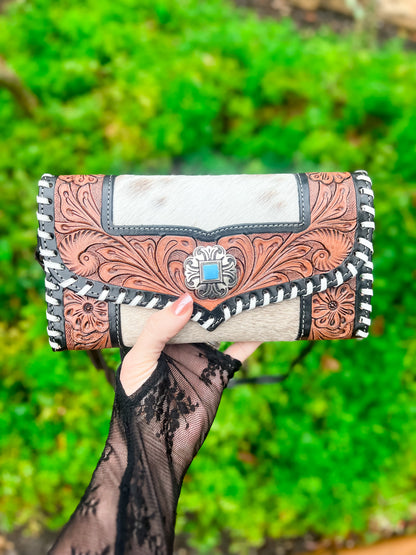 Hand Tooled brown leather and cowhide clutch with strap