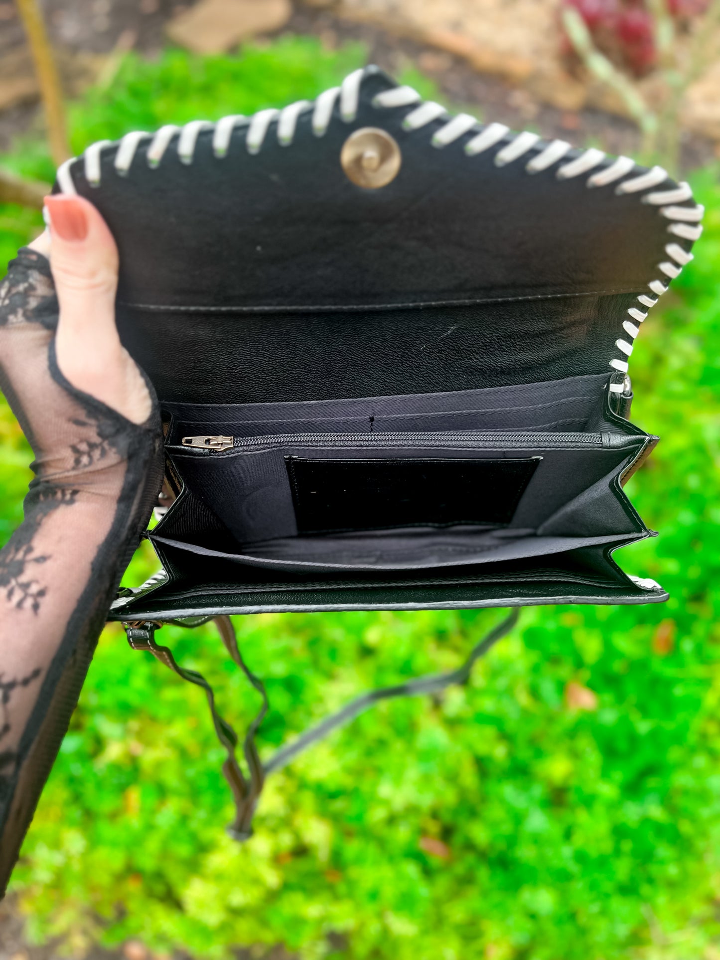 Hand Tooled brown leather and cowhide clutch with strap