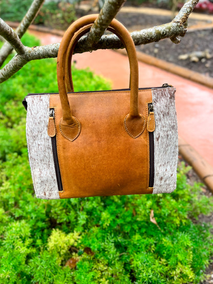 Camel brown leather hand tooled design with cowhide concealed carry purse